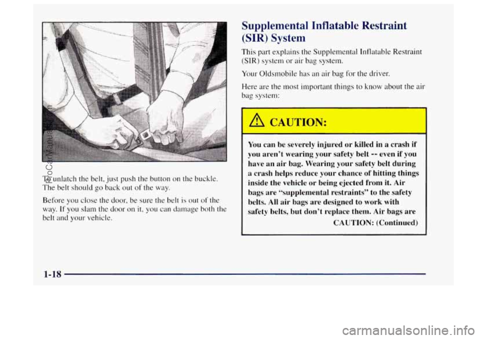OLDSMOBILE BRAVADA 1997 Owners Manual To unlatch the belt,  just push  the button on the buckle. 
The  belt should  go back 
out of the  way. 
Before  you close  the door,  be sure  the  belt 
is out of the 
way. 
If you slam the  door on