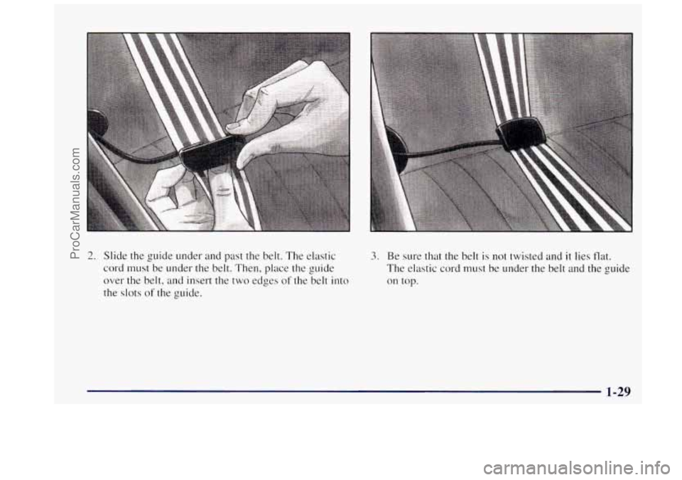 OLDSMOBILE BRAVADA 1997 Owners Guide 2. Slide the guide under  and past  the belt. The elastic 
cord must  be under  the belt.  Then,  place the guide 
over  the belt,  and insert  the two  edges 
of the  belt  into 
the slots 
of the  g