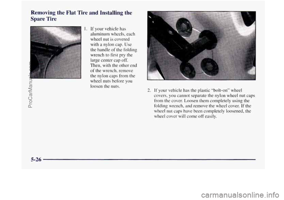 OLDSMOBILE SILHOUETTE 1997  Owners Manual Removing  the  Flat  Tire  and  Installing  the 
Spare  Tire 
1. If your vehicle has 
aluminum wheels, each 
wheel 
nut is  covered 
with 
a nylon  cap. Use 
the handle  of the folding 
wrench 
to fir