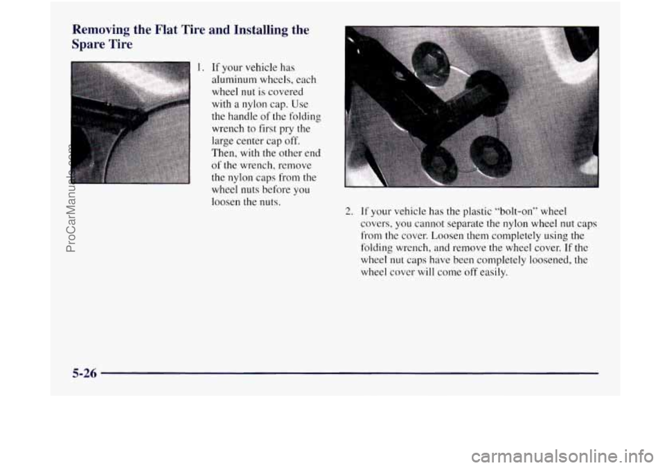 OLDSMOBILE SILHOUETTE 1997  Owners Manual Removing  the  Flat  Tire  and  Installing  the 
Spare  Tire 
1. If your vehicle has 
aluminum wheels, each 
wheel 
nut is  covered 
with 
a nylon  cap. Use 
the handle  of the folding 
wrench 
to fir