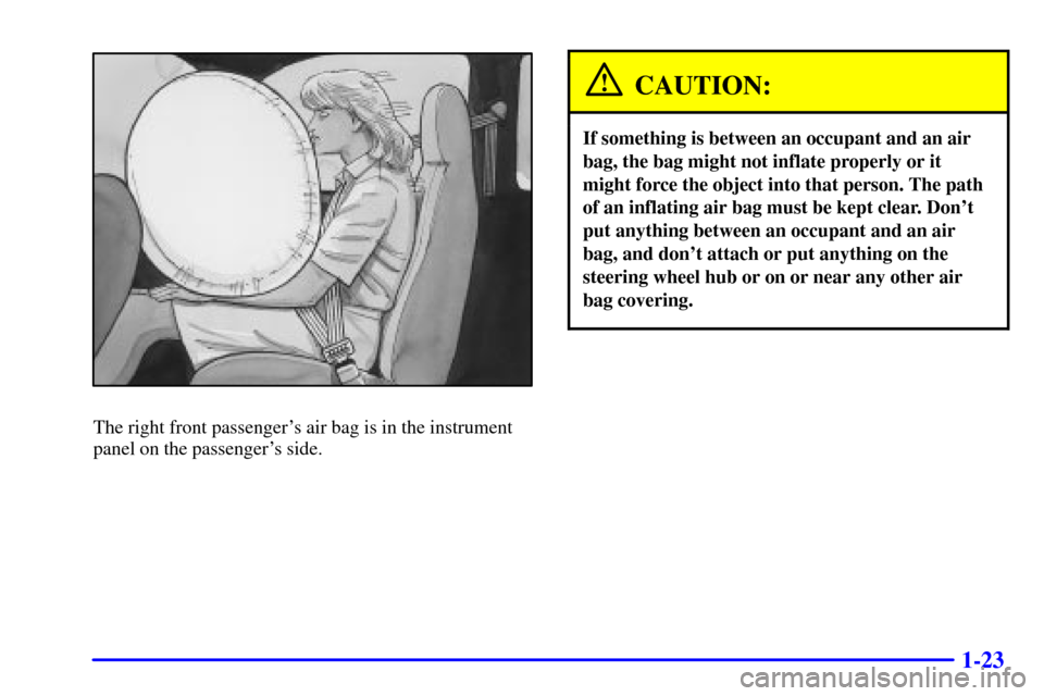 Oldsmobile Bravada 2000  s Owners Guide 1-23
The right front passengers air bag is in the instrument
panel on the passengers side.
CAUTION:
If something is between an occupant and an air
bag, the bag might not inflate properly or it
might