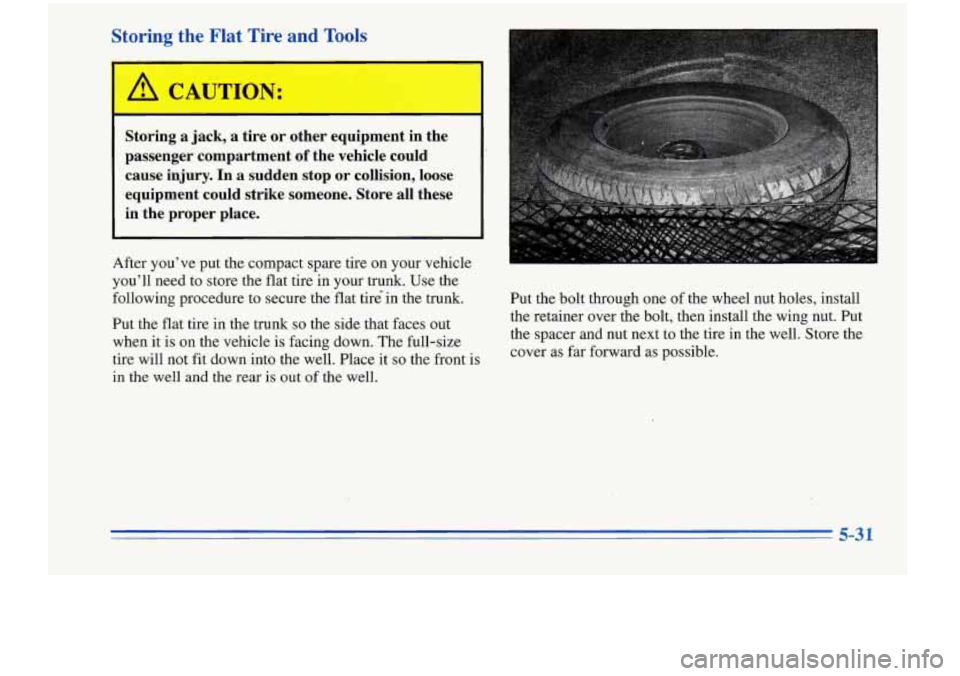 Oldsmobile Cutlass Supreme 1996  Owners Manuals Storing  the  Flat  Tire  and Tools 
b 
Storing  a  jack,  a  tire  or  other  equipment  in  the 
passenger  compartment 
of the  vehicle  could 
cause  injury. 
In a  sudden  stop  or  collision,  l