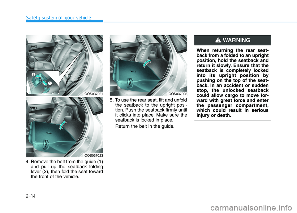 HYUNDAI KONA EV 2021 Owners Manual 2-14
4. Remove the belt from the guide (1)
and pull up the seatback folding
lever (2), then fold the seat toward
the front of the vehicle.5. To use the rear seat, lift and unfold
the seatback to the u