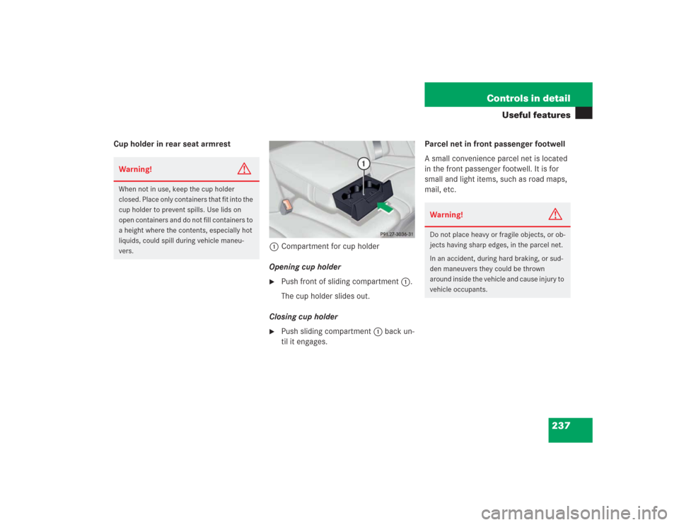 MERCEDES-BENZ S500 2004 W220 Owners Manual 237 Controls in detail
Useful features
Cup holder in rear seat armrest
1Compartment for cup holder
Opening cup holder

Push front of sliding compartment1.
The cup holder slides out.
Closing cup holde