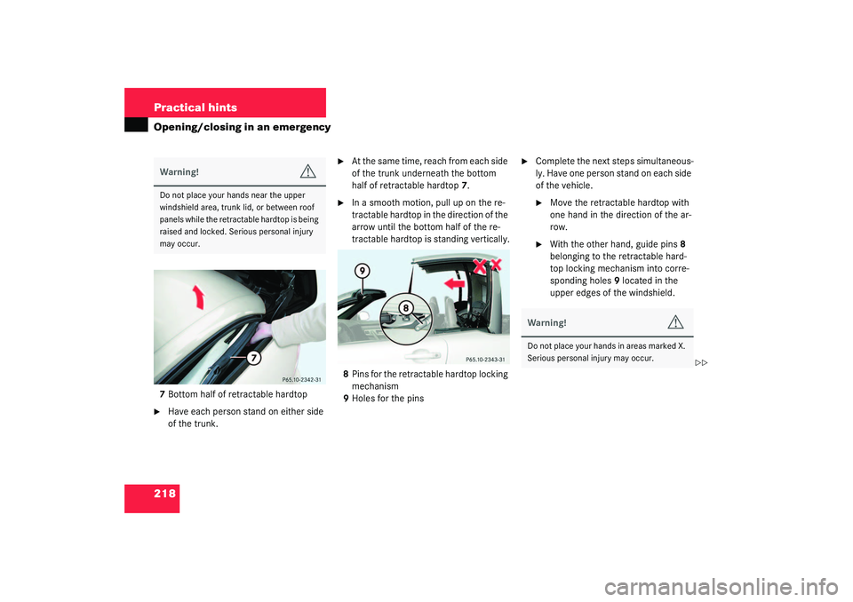 MERCEDES-BENZ SLK CLASS 2003  Owners Manual 218 Practical hintsOpening/closing in an emergency7Bottom half of retractable hardtop
Have each person stand on either side 
of the trunk.

At the same time, reach from each side 
of the trunk under