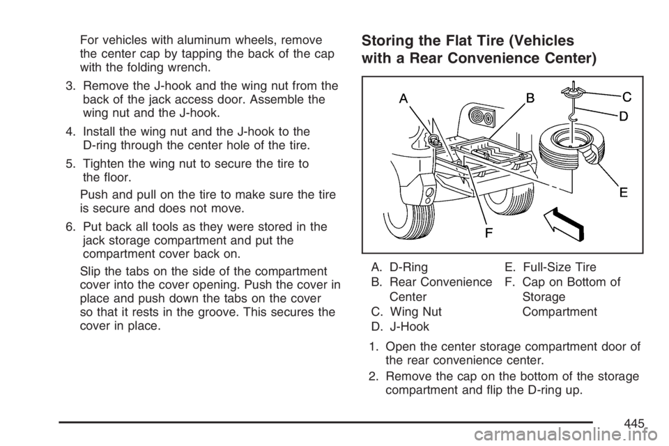 BUICK RANDEZVOUS 2007 Repair Manual For vehicles with aluminum wheels, remove
the center cap by tapping the back of the cap
with the folding wrench.
3. Remove the J-hook and the wing nut from the
back of the jack access door. Assemble t
