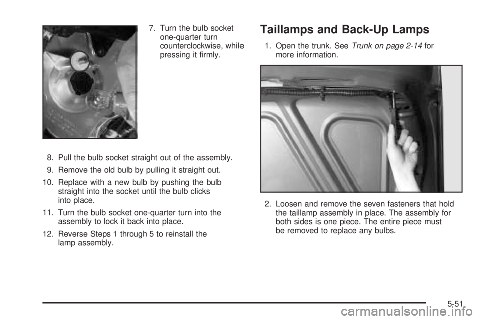 BUICK LESABRE 2005  Owners Manual 7. Turn the bulb socket
one-quarter turn
counterclockwise, while
pressing it �rmly.
8. Pull the bulb socket straight out of the assembly.
9. Remove the old bulb by pulling it straight out.
10. Replace