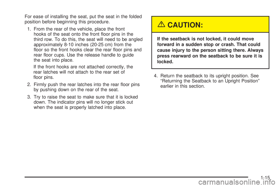 BUICK TERRAZA 2005 Owners Guide For ease of installing the seat, put the seat in the folded
position before beginning this procedure.
1. From the rear of the vehicle, place the front
hooks of the seat onto the front �oor pins in the