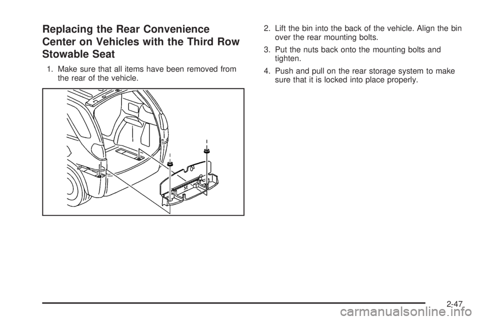 BUICK RANDEZVOUS 2004 Owners Guide Replacing the Rear Convenience
Center on Vehicles with the Third Row
Stowable Seat
1. Make sure that all items have been removed from
the rear of the vehicle.2. Lift the bin into the back of the vehic
