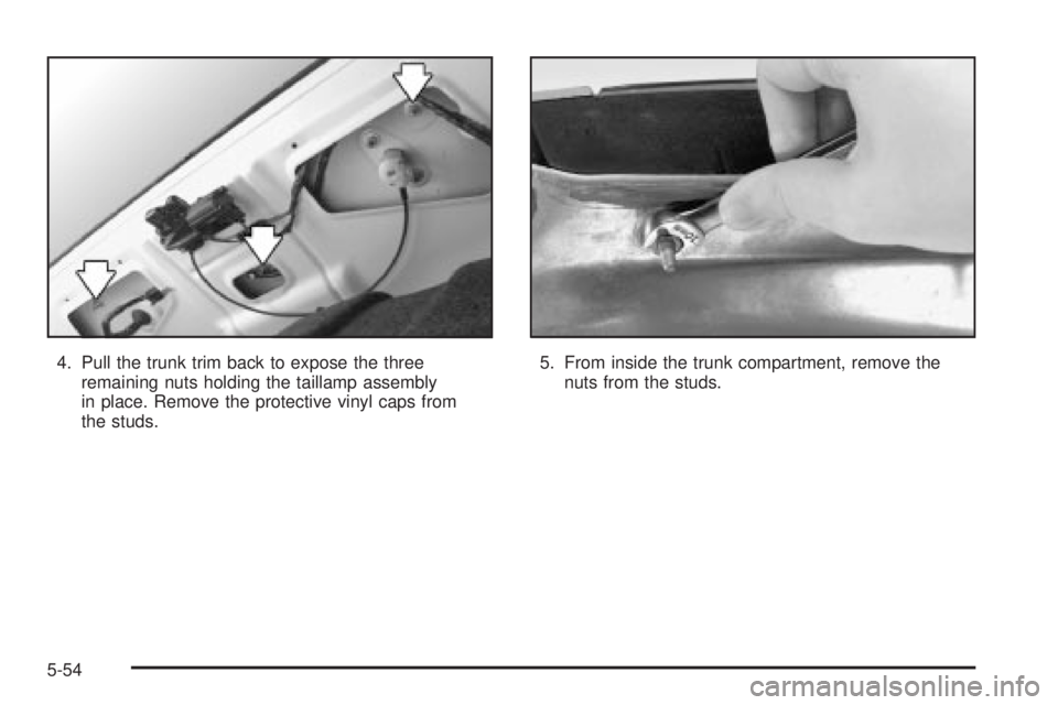 BUICK PARK AVENUE 2003  Owners Manual 4. Pull the trunk trim back to expose the three
remaining nuts holding the taillamp assembly
in place. Remove the protective vinyl caps from
the studs.5. From inside the trunk compartment, remove the
