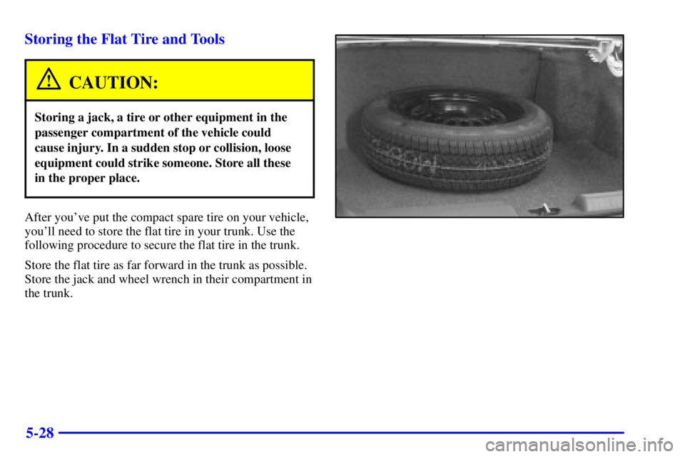 BUICK LESABRE 2002  Owners Manual 5-28 Storing the Flat Tire and Tools
CAUTION:
Storing a jack, a tire or other equipment in the
passenger compartment of the vehicle could
cause injury. In a sudden stop or collision, loose
equipment c