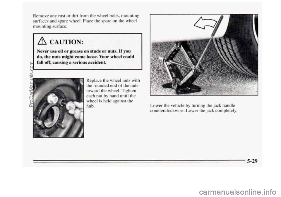 BUICK REGAL 1995  Owners Manual Replace the  wheel  nuts  with 
the- rounded  end of the nuts 
toward  the wheel. Tighten 
each 
nut by  hand until the 
wheel  is held  against  the 
Lower 
the vehicle by turning the jack handle 
co