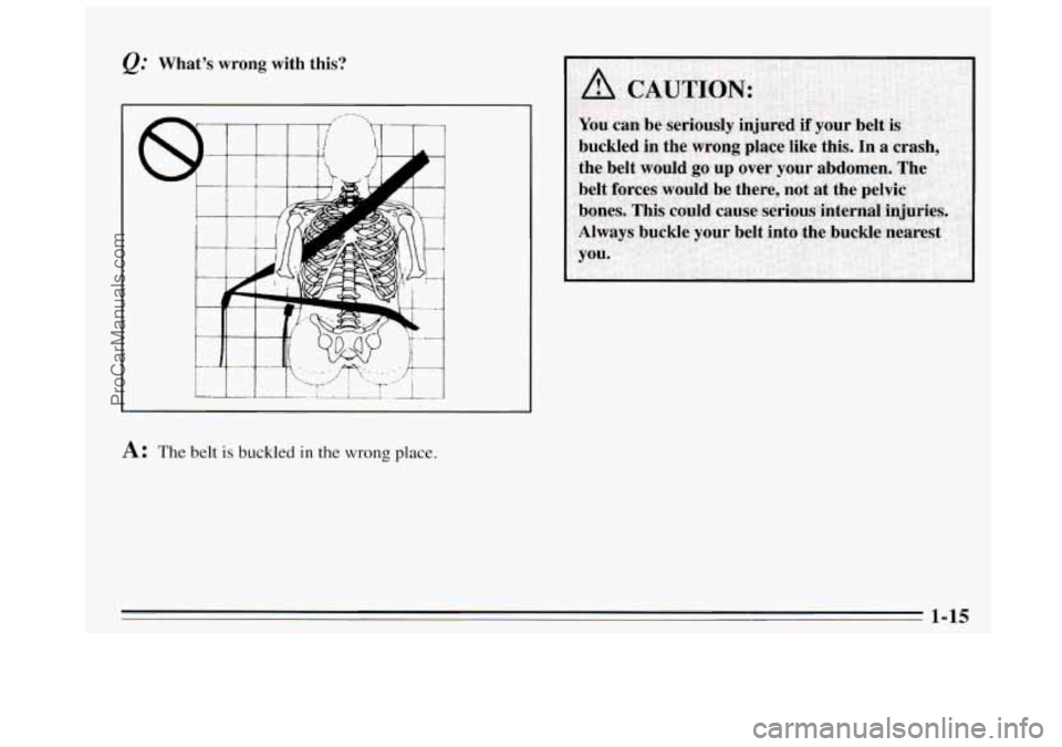 BUICK REGAL 1995 Owners Manual &. Whats  wrong  with  this? 
A: The belt is buckled in the wrong place. 
.. . , .. . . .. ..... 
ProCarManuals.com 