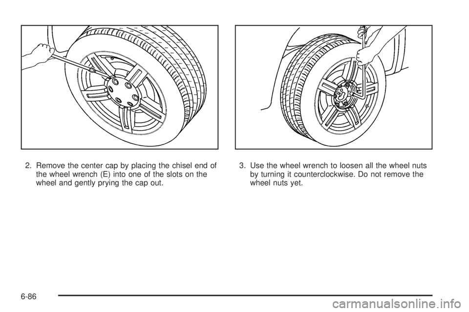 GMC CANYON 2010  Owners Manual 2. Remove the center cap by placing the chisel end of
the wheel wrench (E) into one of the slots on the
wheel and gently prying the cap out.3. Use the wheel wrench to loosen all the wheel nuts
by turn