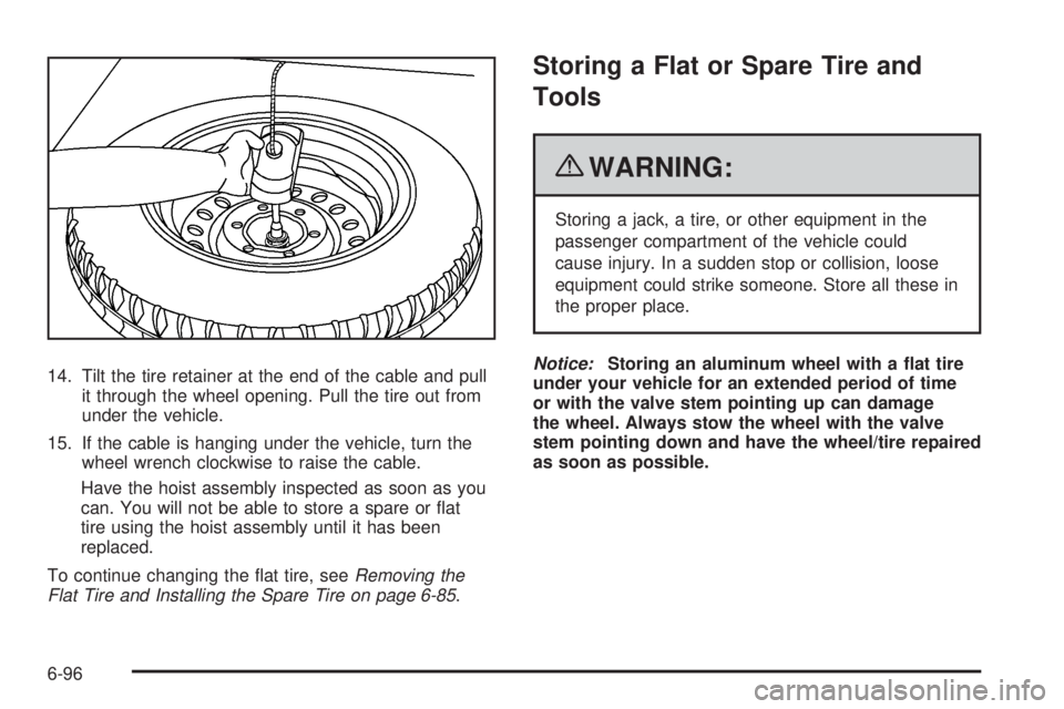 GMC CANYON 2010  Owners Manual 14. Tilt the tire retainer at the end of the cable and pull
it through the wheel opening. Pull the tire out from
under the vehicle.
15. If the cable is hanging under the vehicle, turn the
wheel wrench