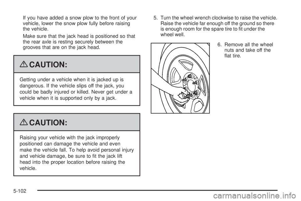 GMC SIERRA 2009  Owners Manual If you have added a snow plow to the front of your
vehicle, lower the snow plow fully before raising
the vehicle.
Make sure that the jack head is positioned so that
the rear axle is resting securely b