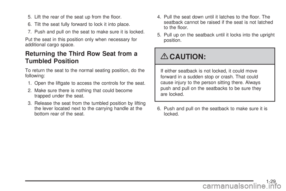 GMC YUKON 2009 Owners Guide 5. Lift the rear of the seat up from the �oor.
6. Tilt the seat fully forward to lock it into place.
7. Push and pull on the seat to make sure it is locked.
Put the seat in this position only when nec