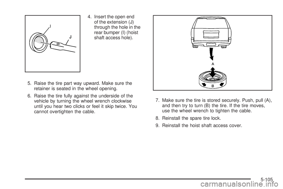 GMC YUKON 2009  Owners Manual 4. Insert the open end
of the extension (J)
through the hole in the
rear bumper (I) (hoist
shaft access hole).
5. Raise the tire part way upward. Make sure the
retainer is seated in the wheel opening.