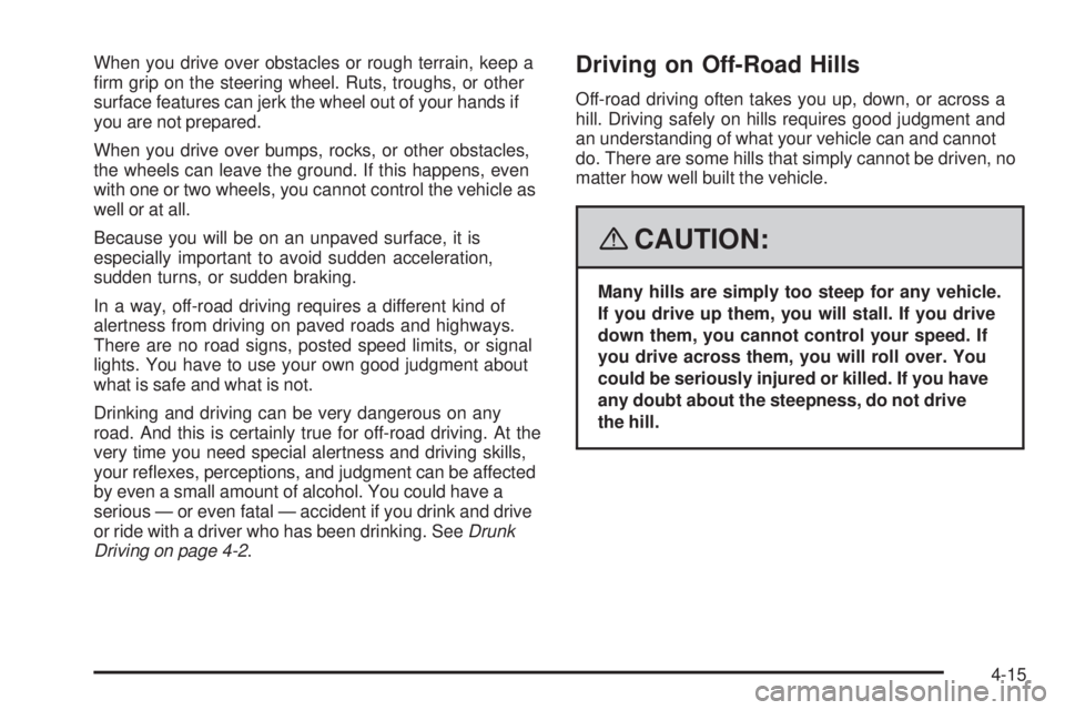 GMC CANYON 2008  Owners Manual When you drive over obstacles or rough terrain, keep a
�rm grip on the steering wheel. Ruts, troughs, or other
surface features can jerk the wheel out of your hands if
you are not prepared.
When you d