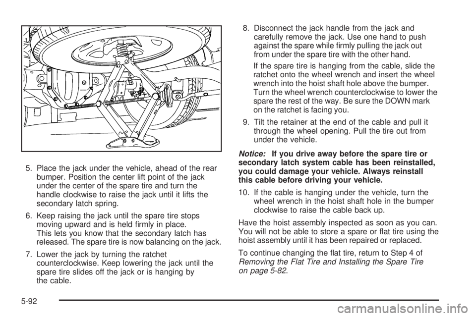 GMC SAVANA 2008 Owners Manual 5. Place the jack under the vehicle, ahead of the rear
bumper. Position the center lift point of the jack
under the center of the spare tire and turn the
handle clockwise to raise the jack until it li GMC SAVANA 2008 Owners Manual 5. Place the jack under the vehicle, ahead of the rear
bumper. Position the center lift point of the jack
under the center of the spare tire and turn the
handle clockwise to raise the jack until it li
