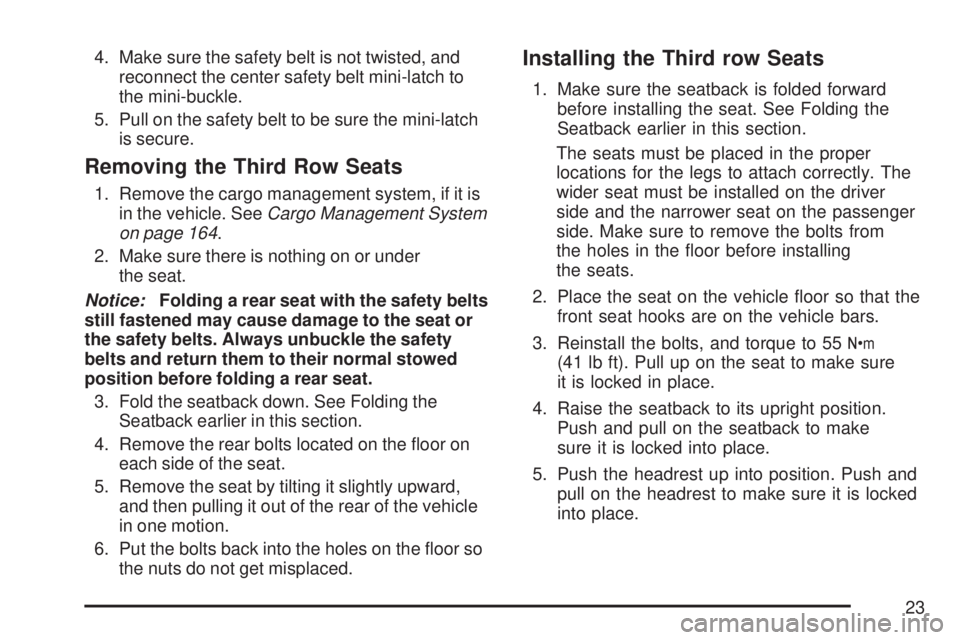 GMC ACADIA 2007  Owners Manual 4. Make sure the safety belt is not twisted, and
reconnect the center safety belt mini-latch to
the mini-buckle.
5. Pull on the safety belt to be sure the mini-latch
is secure.
Removing the Third Row 