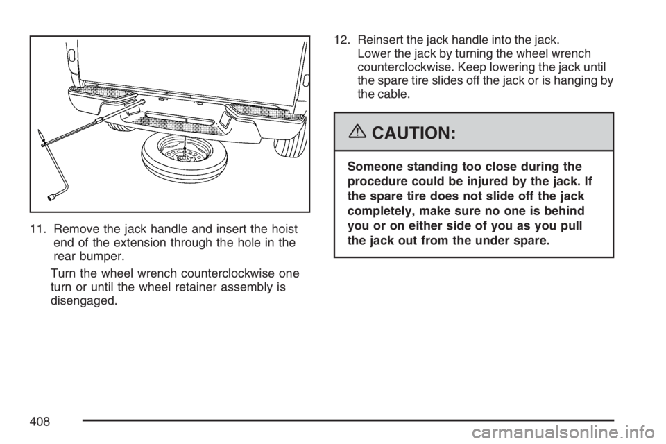 GMC CANYON 2007  Owners Manual 11. Remove the jack handle and insert the hoist
end of the extension through the hole in the
rear bumper.
Turn the wheel wrench counterclockwise one
turn or until the wheel retainer assembly is
diseng