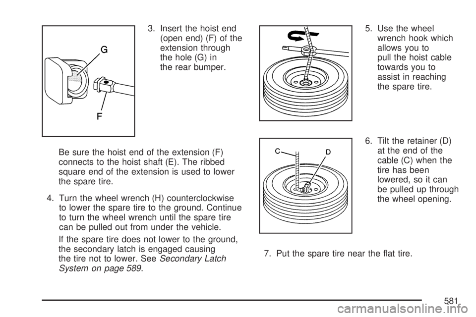 GMC SIERRA 2007  Owners Manual 3. Insert the hoist end
(open end) (F) of the
extension through
the hole (G) in
the rear bumper.
Be sure the hoist end of the extension (F)
connects to the hoist shaft (E). The ribbed
square end of th