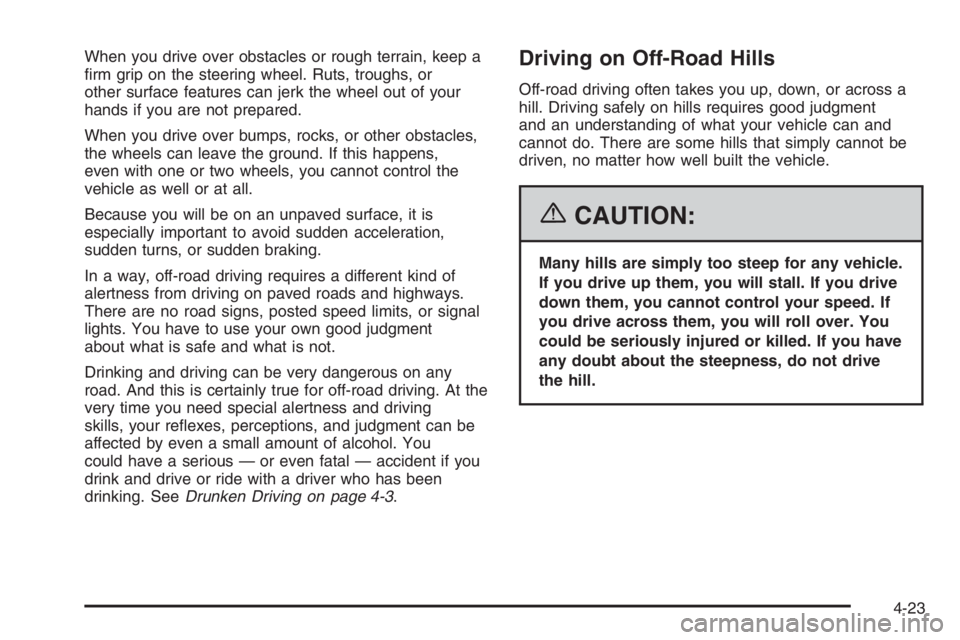 GMC ENVOY 2006  Owners Manual When you drive over obstacles or rough terrain, keep a
�rm grip on the steering wheel. Ruts, troughs, or
other surface features can jerk the wheel out of your
hands if you are not prepared.
When you d