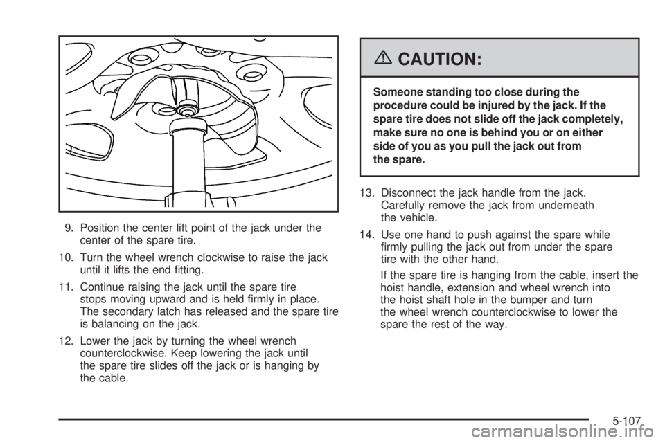 GMC SIERRA 2006  Owners Manual 9. Position the center lift point of the jack under the
center of the spare tire.
10. Turn the wheel wrench clockwise to raise the jack
until it lifts the end �tting.
11. Continue raising the jack unt