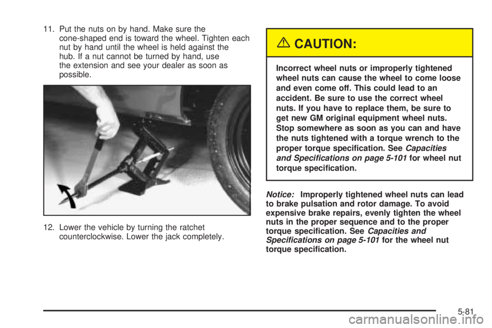 GMC SAFARI 2005 User Guide 11. Put the nuts on by hand. Make sure the
cone-shaped end is toward the wheel. Tighten each
nut by hand until the wheel is held against the
hub. If a nut cannot be turned by hand, use
the extension a