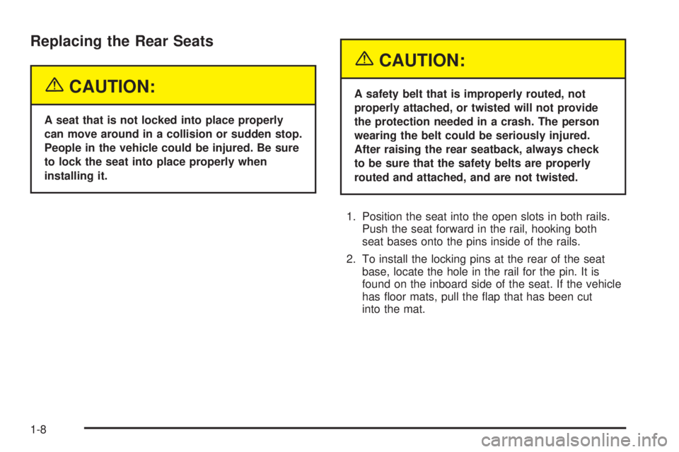 GMC SAVANA 2005 User Guide Replacing the Rear Seats
{CAUTION:
A seat that is not locked into place properly
can move around in a collision or sudden stop.
People in the vehicle could be injured. Be sure
to lock the seat into pl