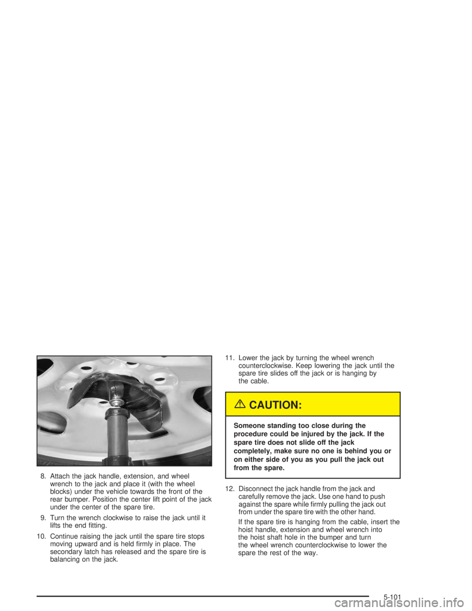 GMC YUKON 2004 Owners Guide 8. Attach the jack handle, extension, and wheel
wrench to the jack and place it (with the wheel
blocks) under the vehicle towards the front of the
rear bumper. Position the center lift point of the ja GMC YUKON 2004 Owners Guide 8. Attach the jack handle, extension, and wheel
wrench to the jack and place it (with the wheel
blocks) under the vehicle towards the front of the
rear bumper. Position the center lift point of the ja