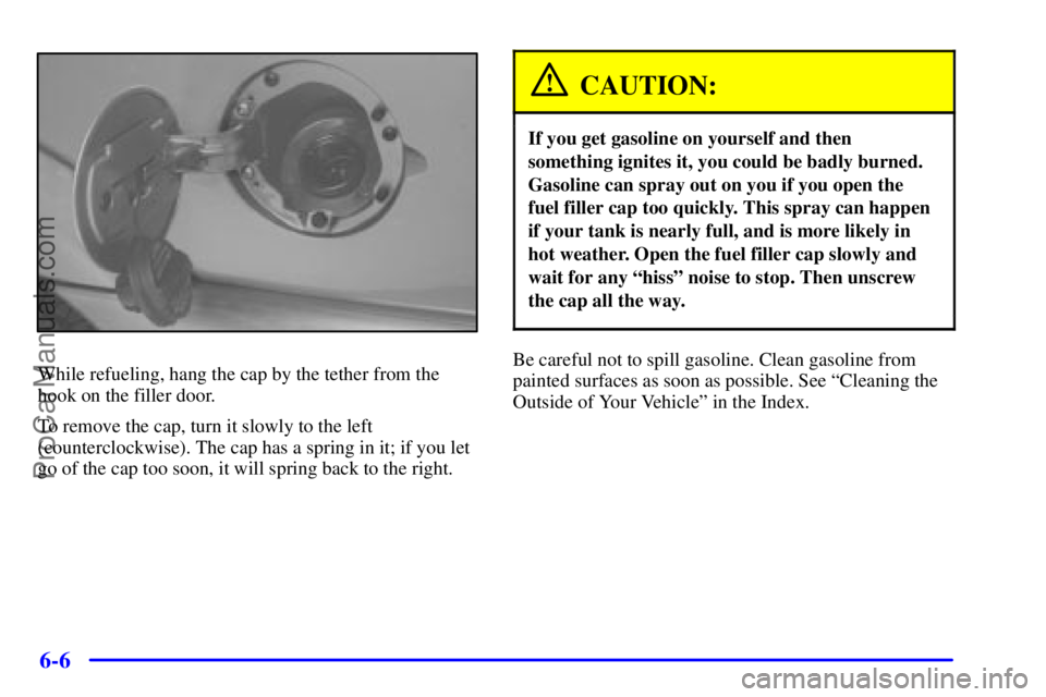 GMC ENVOY 2000  Owners Manual 6-6
While refueling, hang the cap by the tether from the
hook on the filler door.
To remove the cap, turn it slowly to the left
(counterclockwise). The cap has a spring in it; if you let
go of the cap