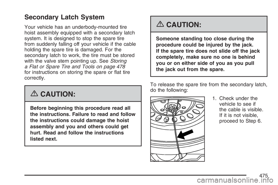 GMC ENVOY DENALI 2007  Owners Manual Secondary Latch System
Your vehicle has an underbody-mounted tire
hoist assembly equipped with a secondary latch
system. It is designed to stop the spare tire
from suddenly falling off your vehicle if