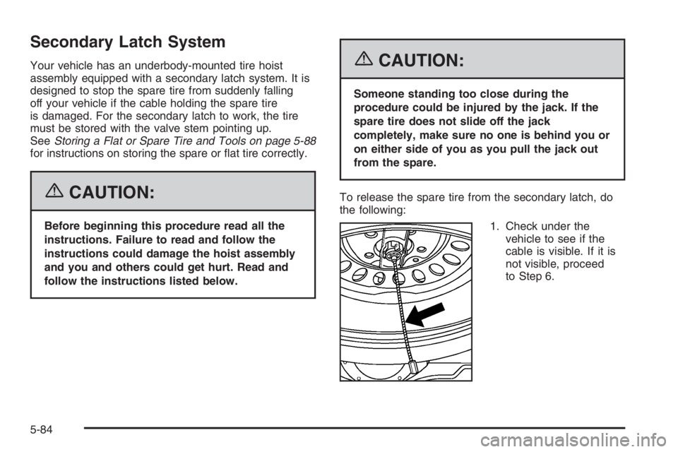 GMC ENVOY DENALI 2006  Owners Manual Secondary Latch System
Your vehicle has an underbody-mounted tire hoist
assembly equipped with a secondary latch system. It is
designed to stop the spare tire from suddenly falling
off your vehicle if