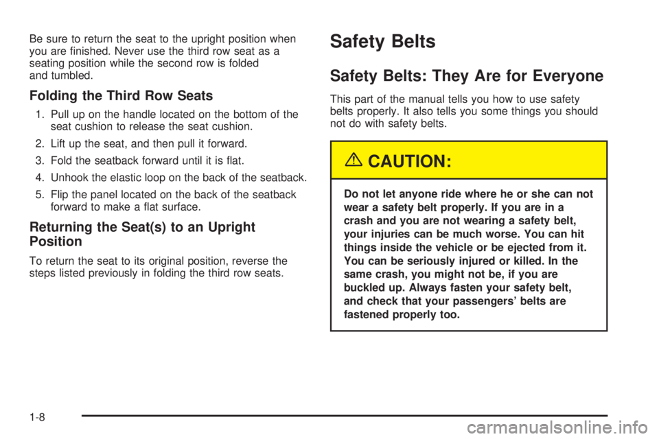 GMC ENVOY DENALI 2005 User Guide Be sure to return the seat to the upright position when
you are �nished. Never use the third row seat as a
seating position while the second row is folded
and tumbled.
Folding the Third Row Seats
1. P