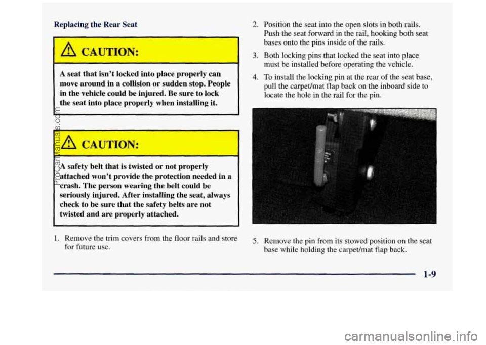 GMC SAVANA 1998 User Guide Replacing the Rear  Seat 
~~ 
/1 CAUTION. 
A seat that  isn’t  locked  into place  properly  can 
move  around  in a collision  or  sudden  stop.  People 
in the  vehicle  could  be  injured. Be sur