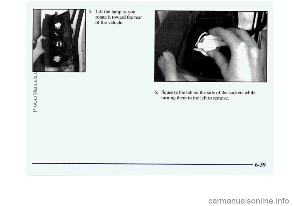 GMC SAVANA 1998  Owners Manual 5. Lift the  lamp  as you 
rotate it toward the rear 
of the vehicle. 
6. Squeeze  the tab on the side of the  sockets  while 
turning them  to the left to remove. 
6-39 
ProCarManuals.com 