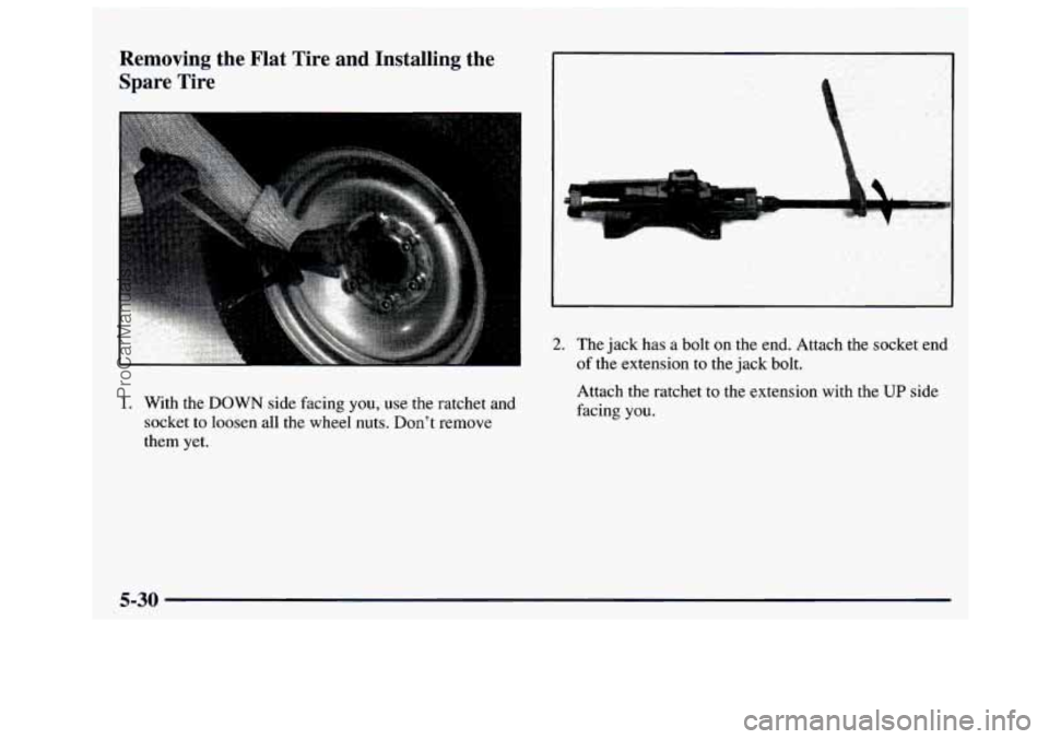 GMC SAVANA 1997  Owners Manual Removing  the  Flat  Tire  and  Installing  the Spare  Tire 
1. With  the  DOWN  side facing you, use the  ratchet and 
socket  to loosen  all the wheel  nuts. Dont  remove 
them  yet. 
2. The  jack 