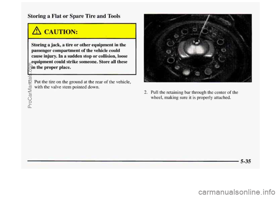 GMC SAVANA 1997  Owners Manual Storing  a Flat or  Spare  Tire  and Tools 
Storing a jack, a  tire  or  other  equipment  in  the 
passenger  compartment 
of the  vehicle  could 
cause  injury.  In 
a sudden  stop  or collision,  l