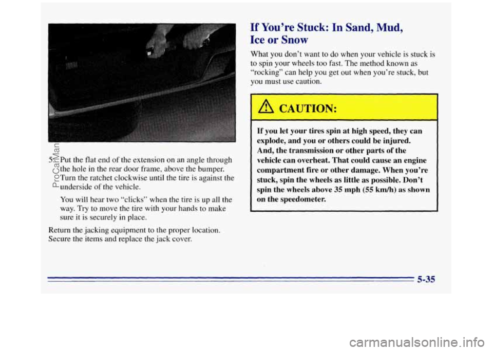 GMC SAVANA 1996  Owners Manual 5. Put the flat  end  of the  extension  on an angle through 
the hole  in the  rear  door  frame,  above the bumper. 
Turn the ratchet  clockwise until the tire is  against the 
underside 
of the veh
