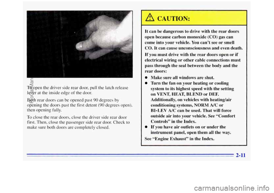 GMC SAVANA 1996 Repair Manual To open the driver side rear door, pull the latch release
lever at the inside edge
of the door.
Both rear doors can be opened past
90 degrees by
opening the doors past the first detent ( GMC SAVANA 1996 Repair Manual To open the driver side rear door, pull the latch release
lever at the inside edge
of the door.
Both rear doors can be opened past
90 degrees by
opening the doors past the first detent (