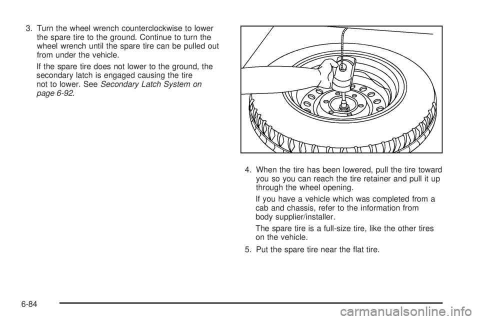 GMC SAVANA PASSENGER 2010  Owners Manual 3. Turn the wheel wrench counterclockwise to lower
the spare tire to the ground. Continue to turn the
wheel wrench until the spare tire can be pulled out
from under the vehicle.
If the spare tire does