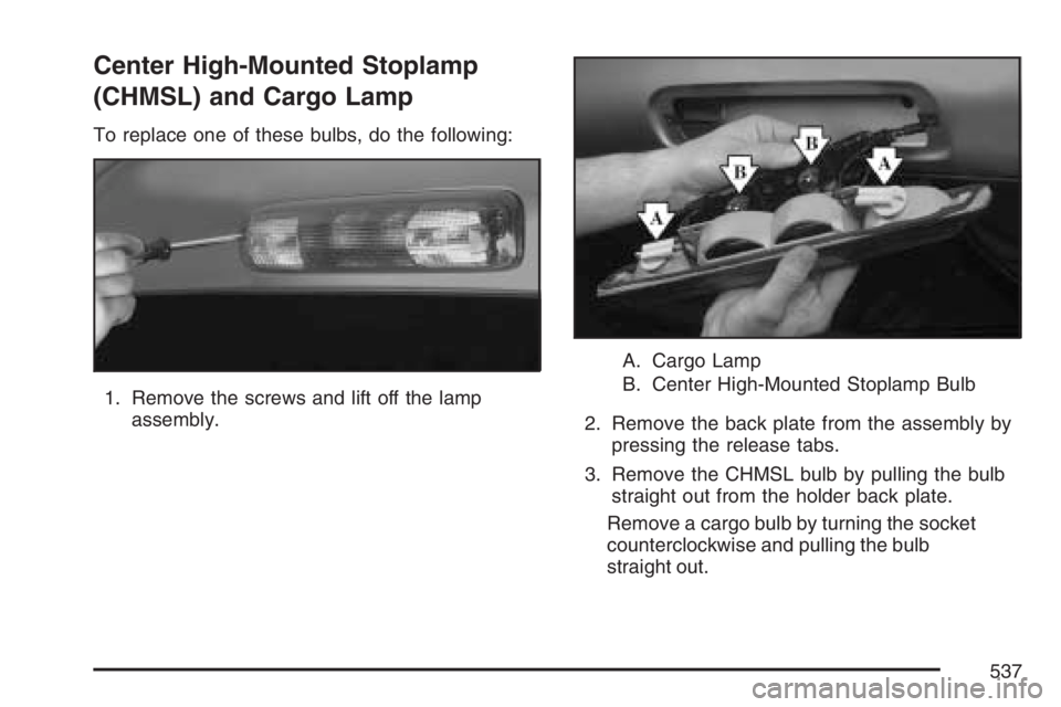 GMC SIERRA CLASSIC 2007  Owners Manual Center High-Mounted Stoplamp
(CHMSL) and Cargo Lamp
To replace one of these bulbs, do the following:
1. Remove the screws and lift off the lamp
assembly.A. Cargo Lamp
B. Center High-Mounted Stoplamp B
