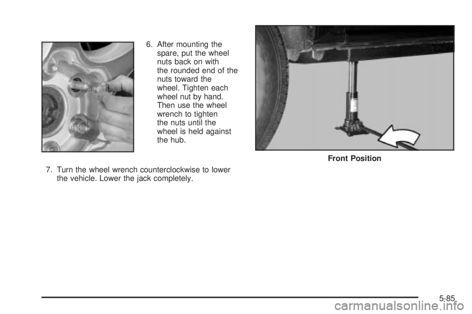 GMC SIERRA DENALI 2004  Owners Manual 6. After mounting the
spare, put the wheel
nuts back on with
the rounded end of the
nuts toward the
wheel. Tighten each
wheel nut by hand.
Then use the wheel
wrench to tighten
the nuts until the
wheel