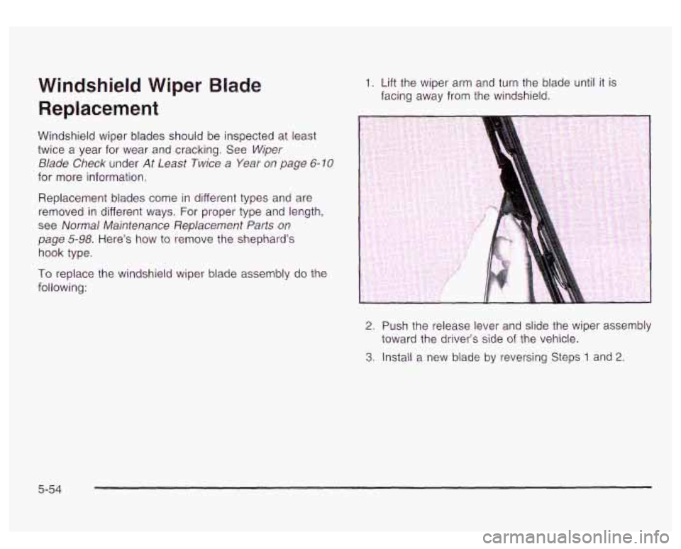 GMC YUKON DENALI 2003  Owners Manual Windshield  Wiper  Blade Replacement 
Windshield wiper  blades should  be  inspected at  least 
twice  a  year  for  wear  and cracking.  See  Wiper 
Blade  Check  under 
At Least Twice a Year on page
