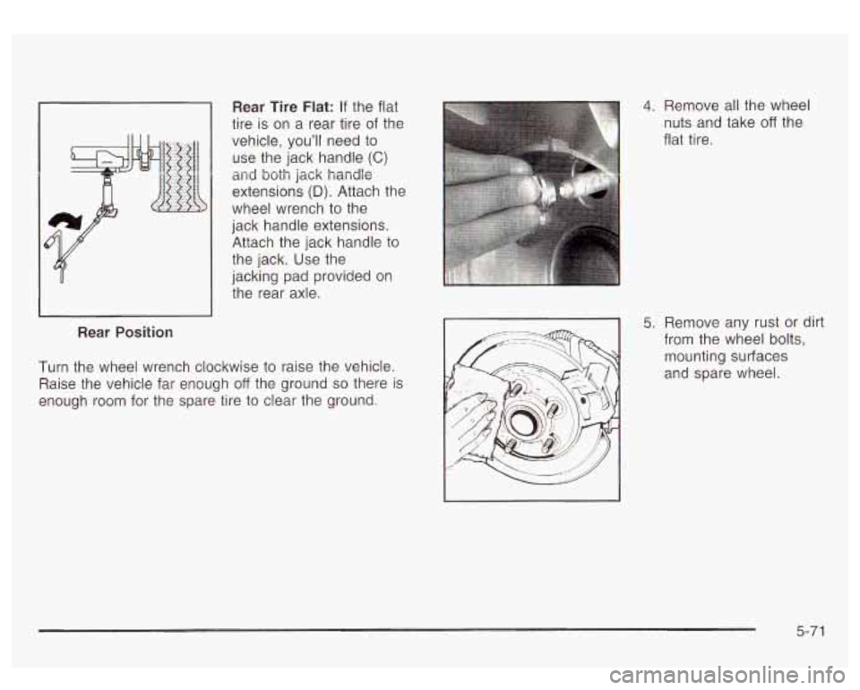 GMC YUKON DENALI 2003  Owners Manual Rear Tire Flat: If the flat 
tire  is on  a  rear tire  of the 
vehicle, 
you’ll need to 
use the jack  handle (C) 
and both jack handle 
extensions 
(D). Attach  the 
wheel wrench  to the 
jack  ha