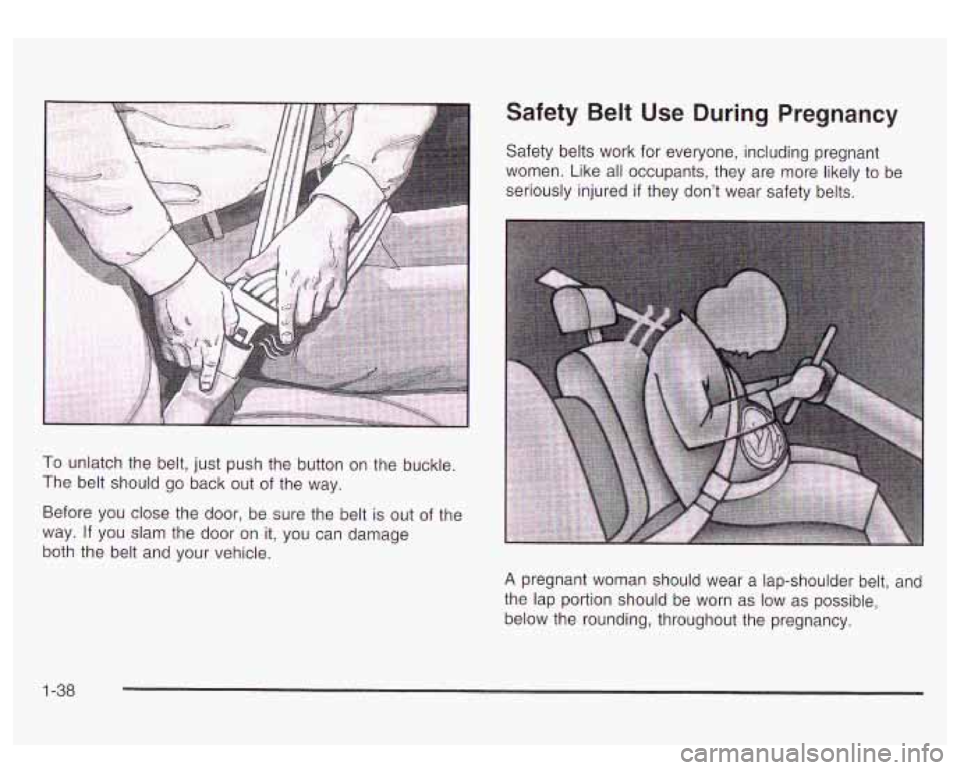 GMC YUKON DENALI 2003 Service Manual To unlatch the belt, just  push the  button on  the buckle. 
The  belt should  go back  out of the  way. 
Before  you close the  door,  be sure the  belt  is out  of the 
way. 
If you  slam  the  door