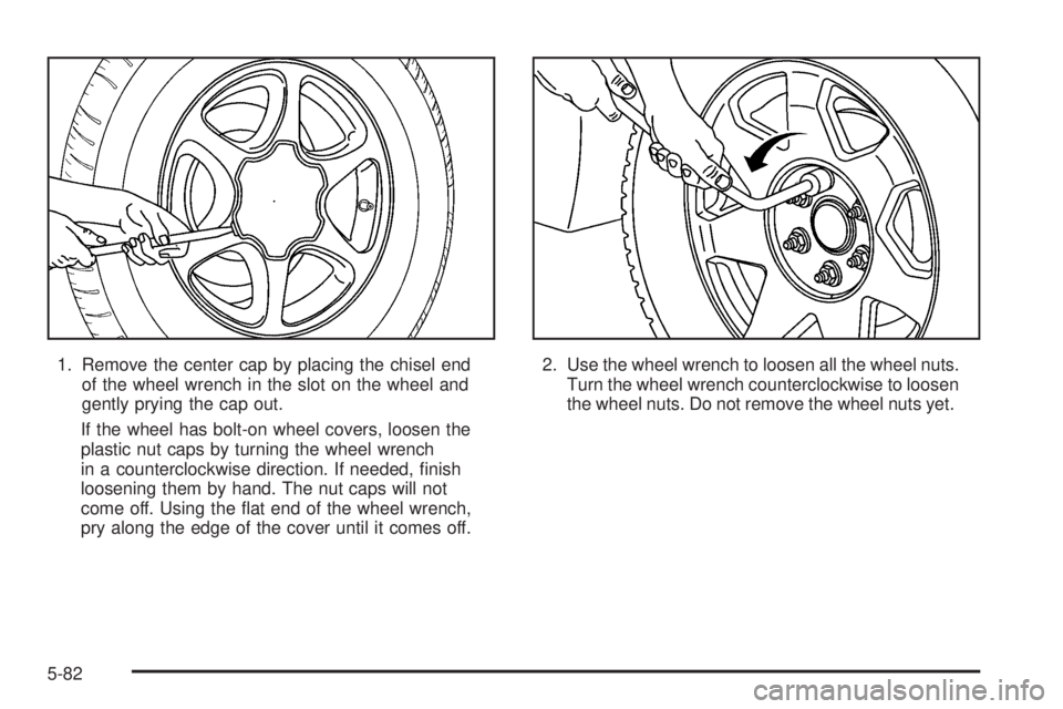 GMC YUKON XL 2006  Owners Manual 1. Remove the center cap by placing the chisel end
of the wheel wrench in the slot on the wheel and
gently prying the cap out.
If the wheel has bolt-on wheel covers, loosen the
plastic nut caps by tur