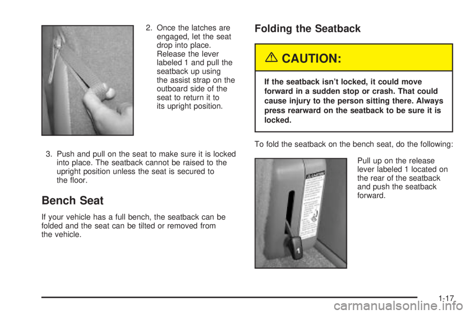 GMC YUKON XL DENALI 2004 Owners Manual 2. Once the latches are
engaged, let the seat
drop into place.
Release the lever
labeled 1 and pull the
seatback up using
the assist strap on the
outboard side of the
seat to return it to
its upright 